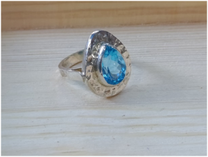 Womens-silver-ring-with-blue-topaz-stone